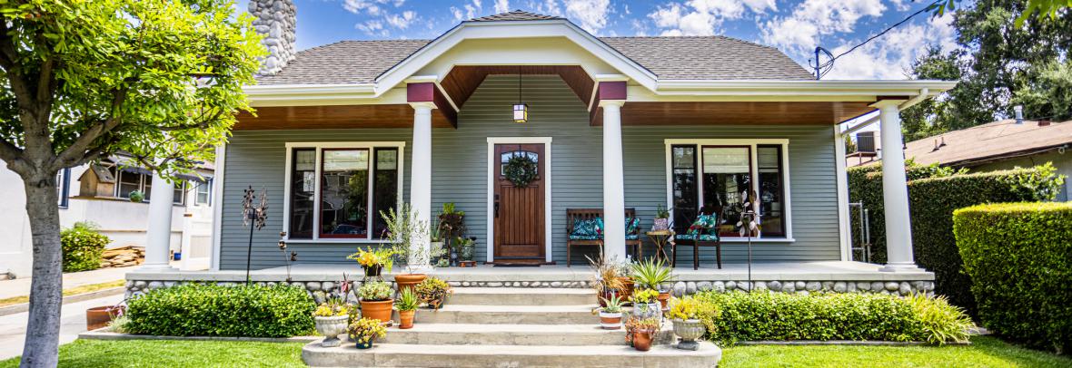 A 1923 Craftsman Bungalow Home with a fresh coat of paint and columns