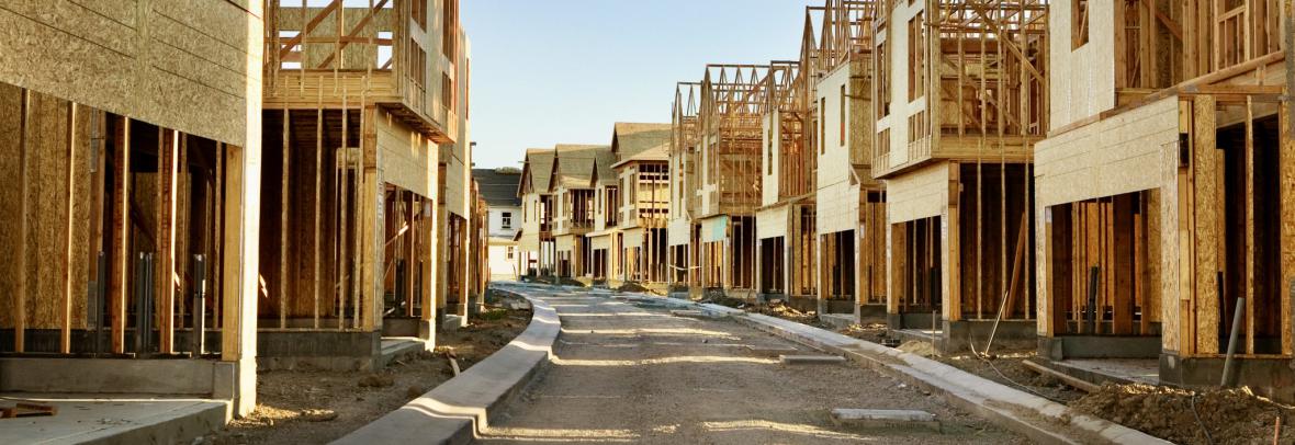 Street lined with homes under construction