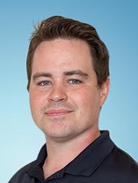 Photo of Nolan Cornu on blue background